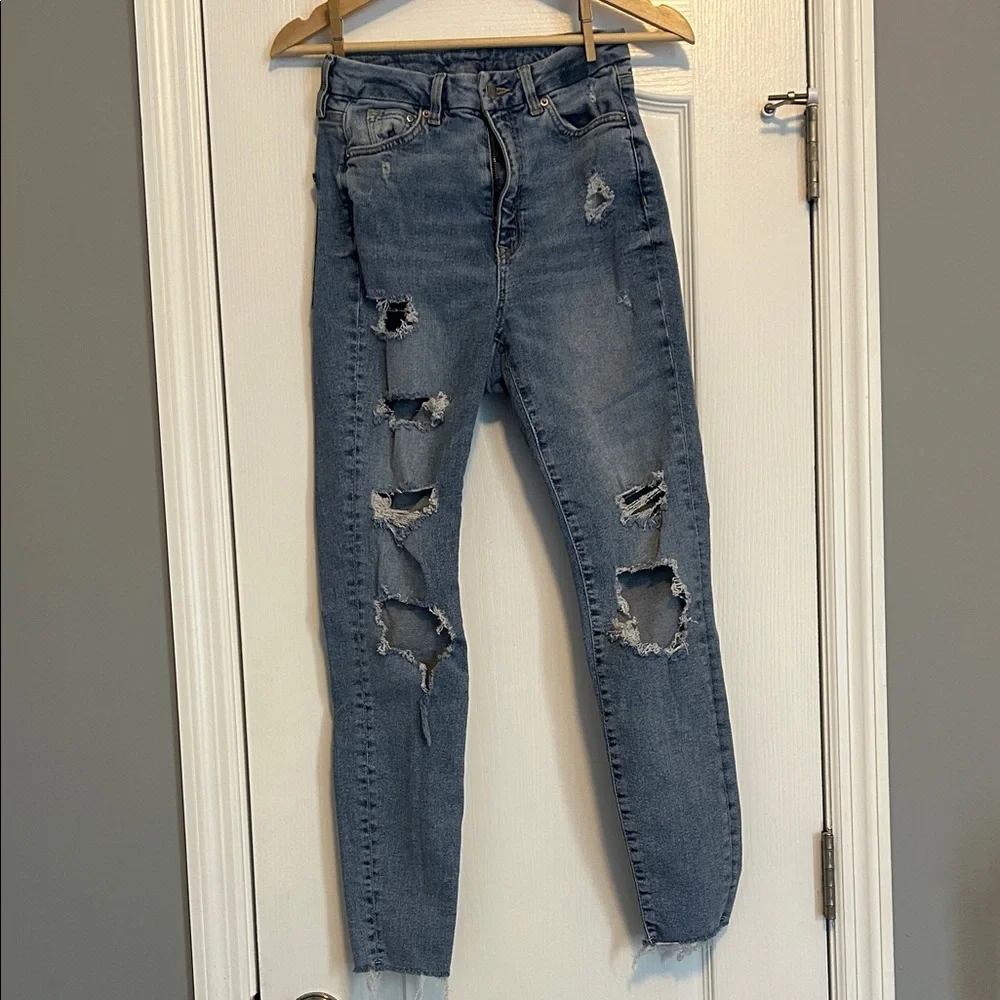 Classic Distressed Skinny Jeans in Blue size 4